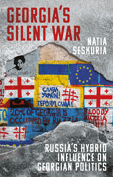 Book cover of Georgia's Silent War showing flags pastiched onto a mountain.